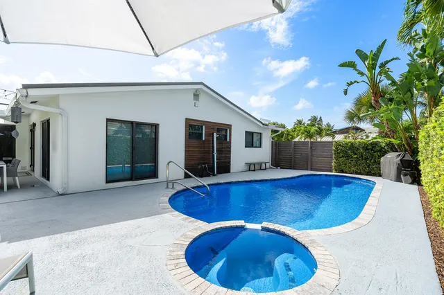 a view of outdoor space and swimming pool