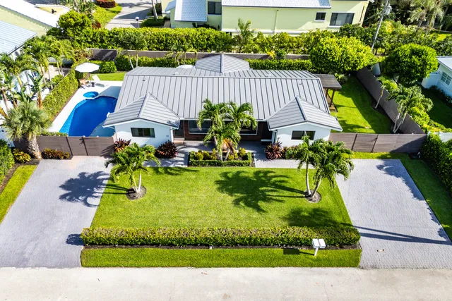 a view of a garden with swimming pool