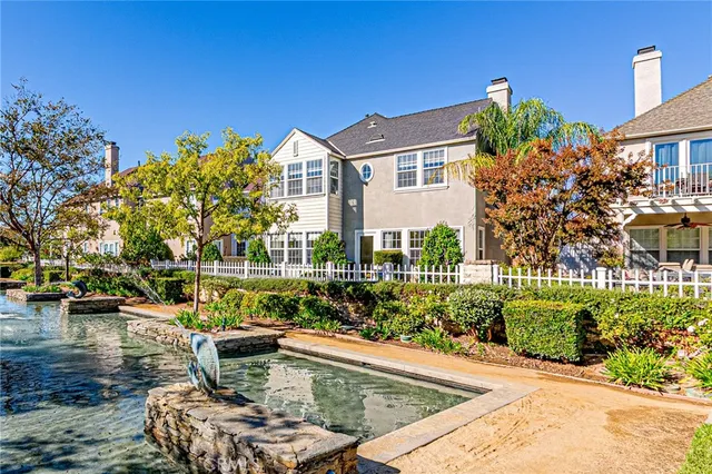 a view of a hallway view with wooden floor and staircase