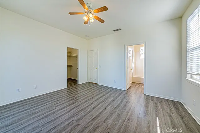 a view of walk in closet with window