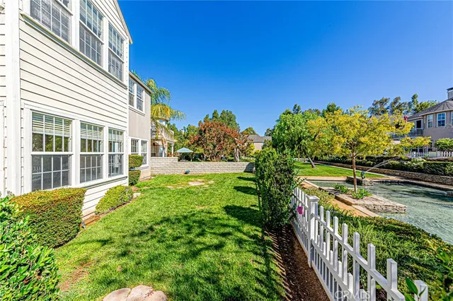 an aerial view of a house with a garden