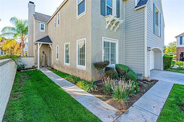 a view of a lake with a house in the background