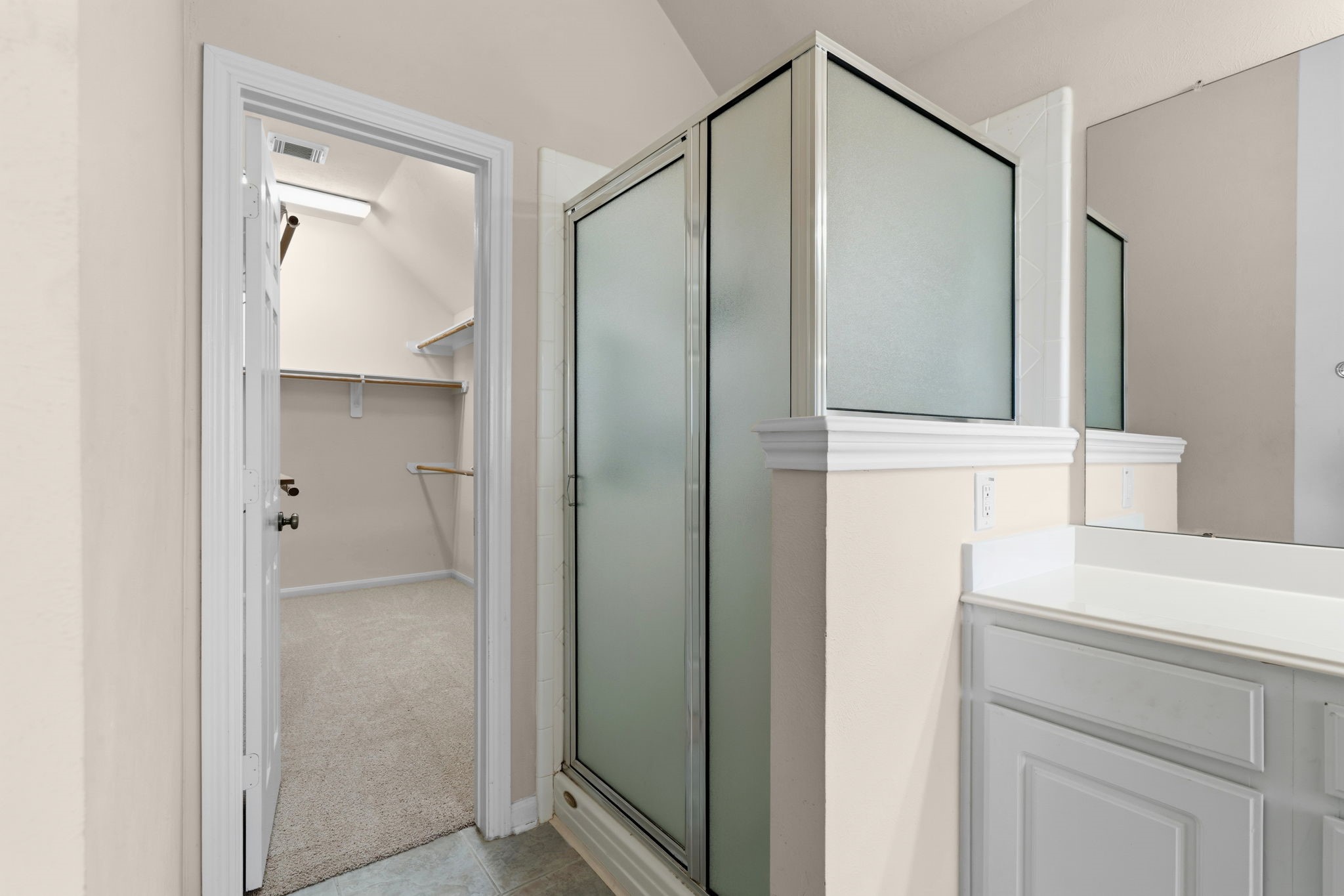 9122 Sunny Ridge Drive Houston, TX 77095 - Photo 14 of 15 a bathroom with a shower and a sink