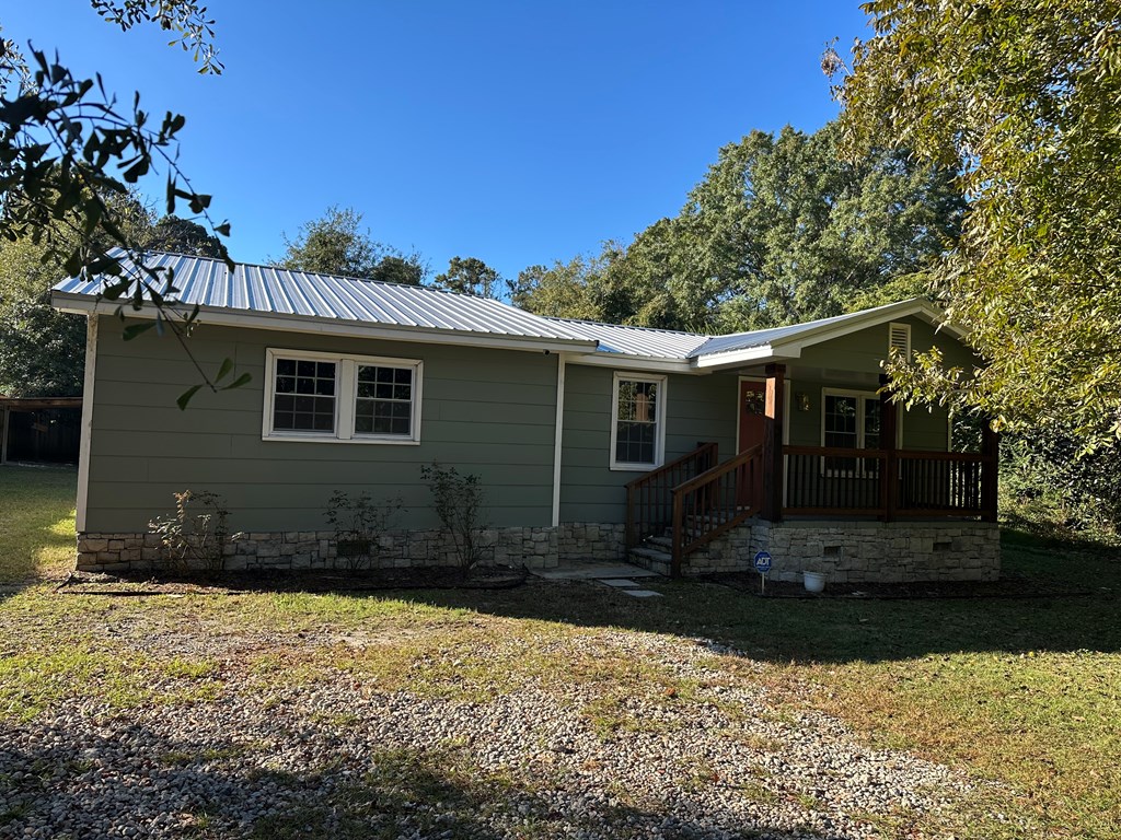 2880 Lamb Road Smiths Station, AL 36877 - Photo 2 of 17 a front view of a house with a yard