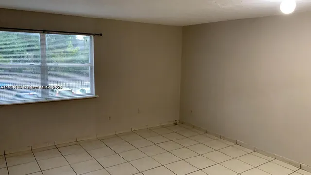 $1,675 | 5501 Northwest 7th Street, Unit E216, Miami, FL 33126