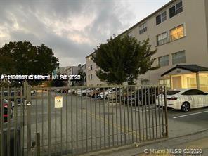 5501 Northwest 7th Street, Unit E216 Miami, FL 33126 - Photo 2 of 12 a city view with tall buildings