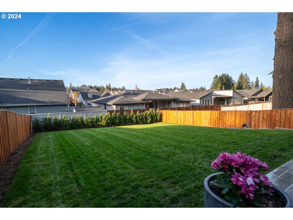 38459 Maple Street Sandy, OR 97055 - Photo 17 of 20 a view of a garden with a lake