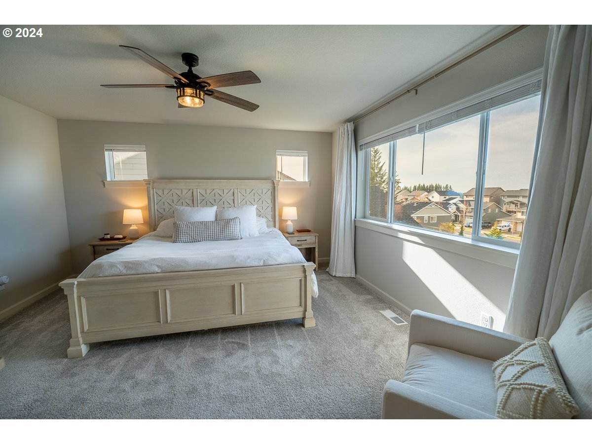 38459 Maple Street Sandy, OR 97055 - Photo 10 of 20 a living room with a bed furniture and a large window