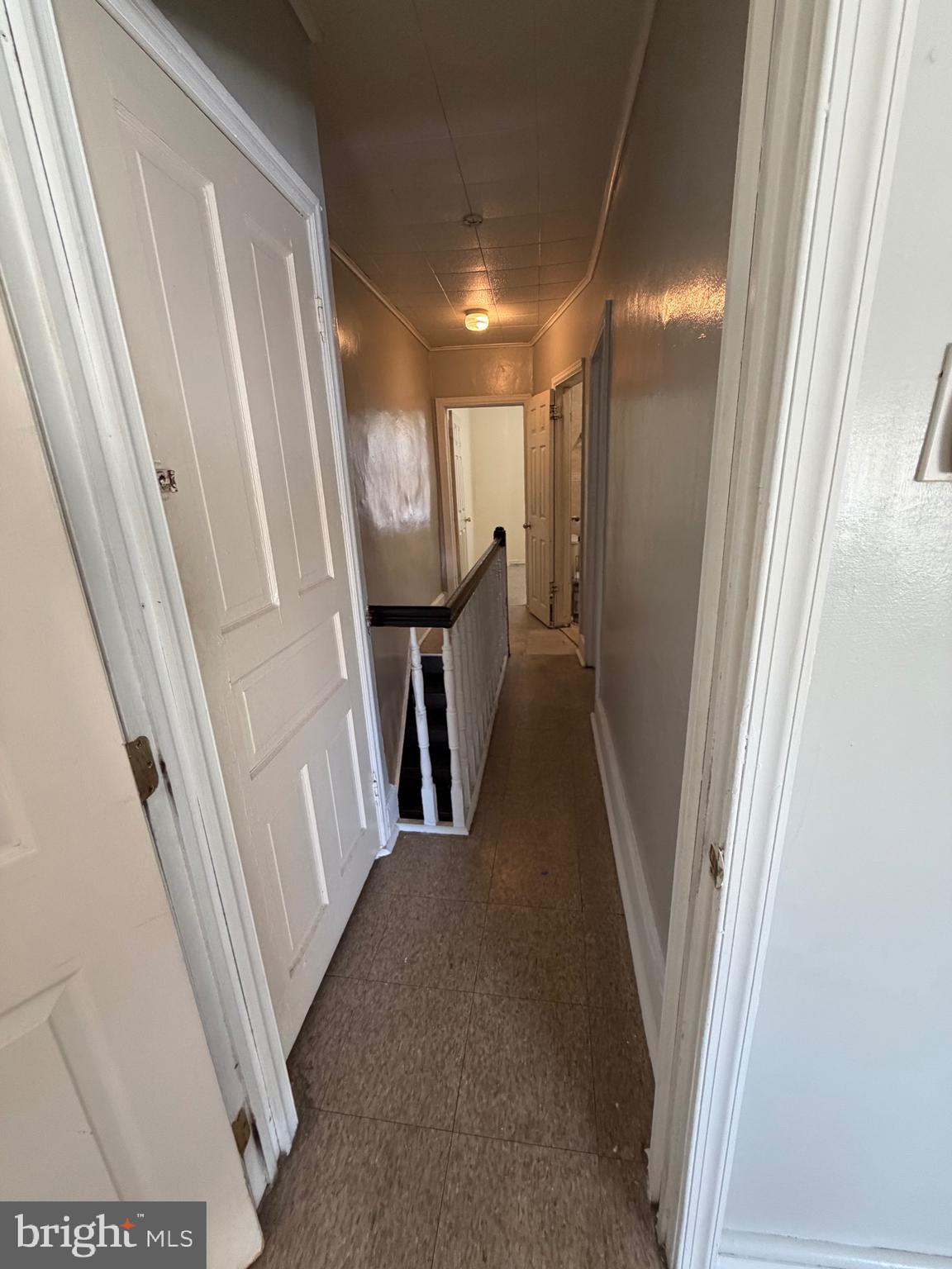 3310 E Street Philadelphia, PA 19134 - Photo 11 of 14 a view of a hallway with wooden floor and staircase