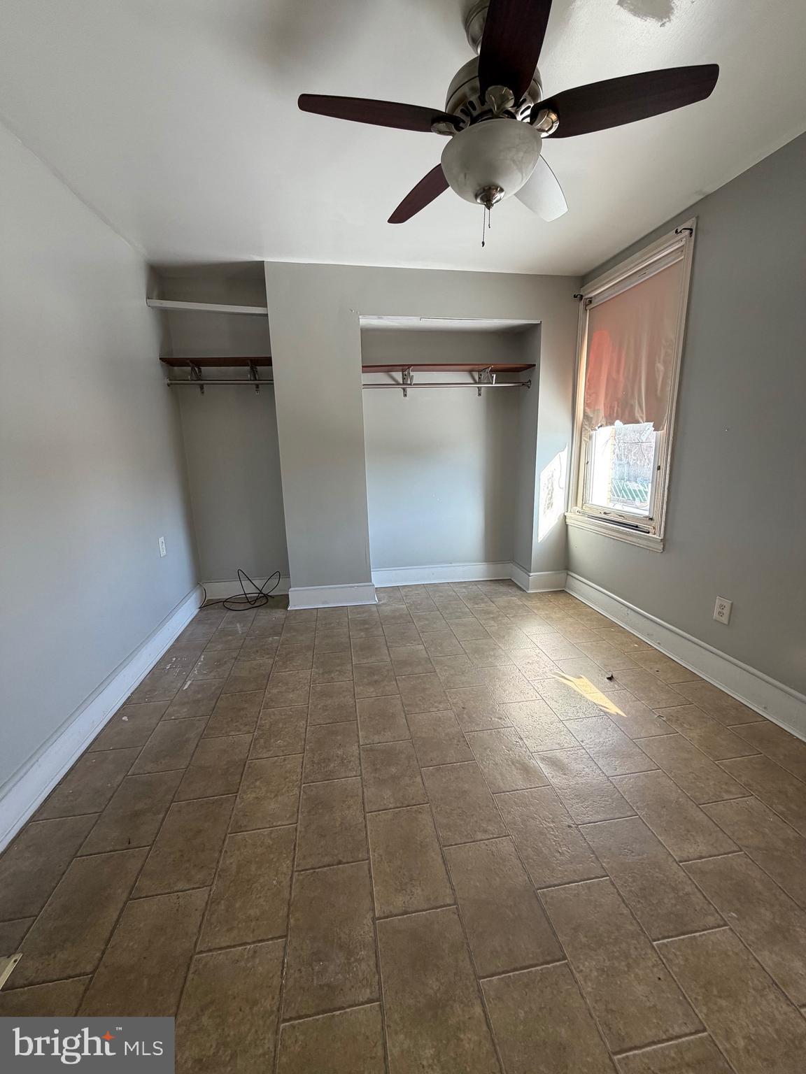 3310 E Street Philadelphia, PA 19134 - Photo 10 of 14 a view of an empty room and window