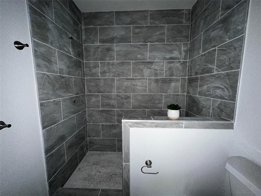 4435 Franklin Street Lancaster, TX 75134 - Photo 9 of 17 a bathroom with a sink