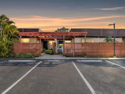 a city street with a building in the background