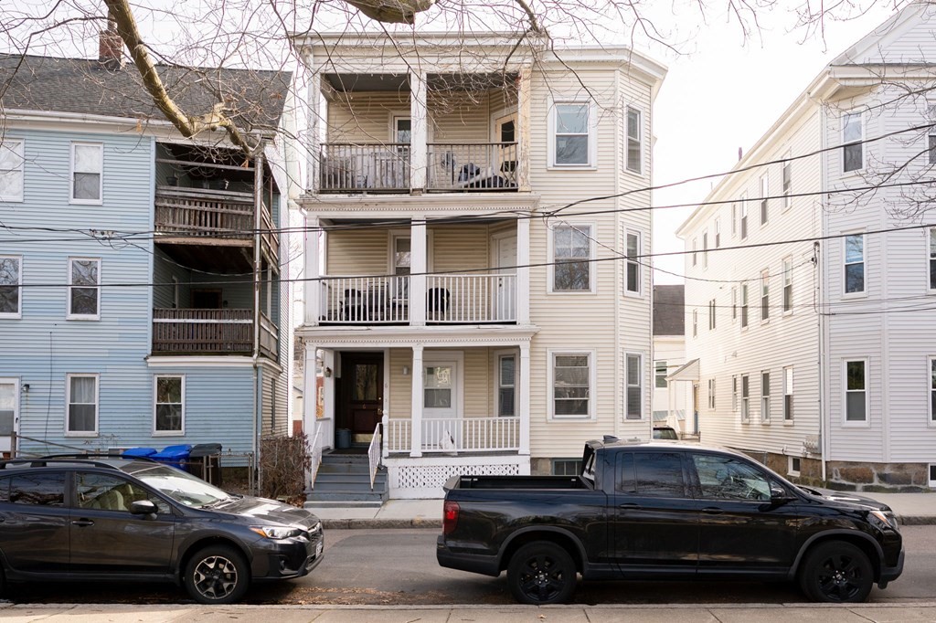 a car parked in front of a house