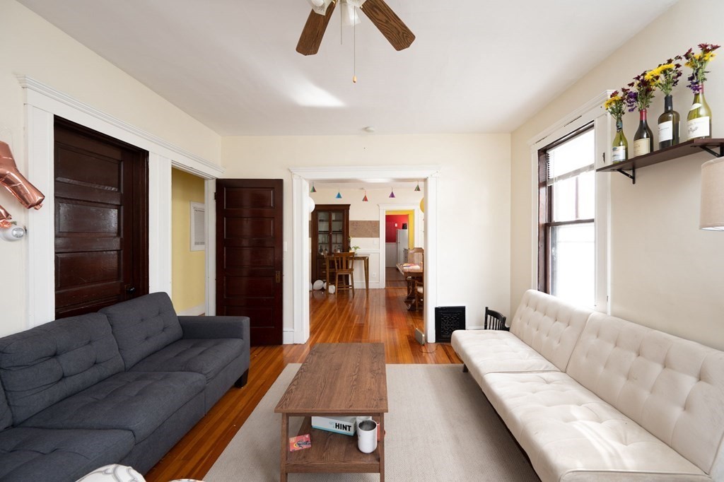 6 Edwin Street Brookline, MA 02445 - Photo 11 of 33 a living room with furniture and a flat screen tv