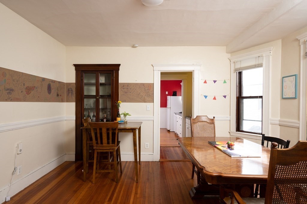 6 Edwin Street Brookline, MA 02445 - Photo 12 of 33 a view of a dining room with furniture and window