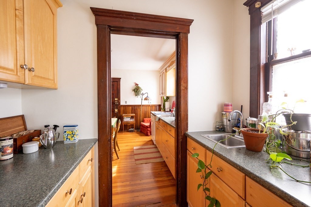 6 Edwin Street Brookline, MA 02445 - Photo 24 of 33 a view of a kitchen and dining room