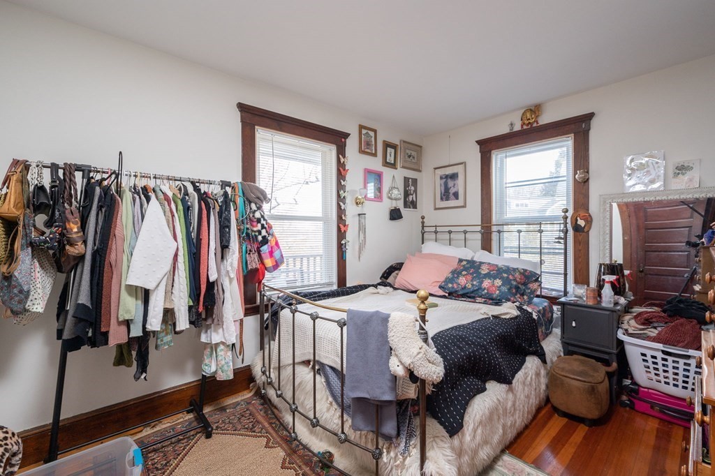 6 Edwin Street Brookline, MA 02445 - Photo 31 of 33 a bedroom with a bed and a window