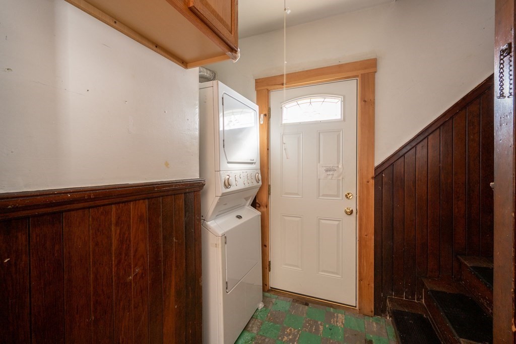 6 Edwin Street Brookline, MA 02445 - Photo 9 of 33 a view of a hallway with wooden floor and entryway