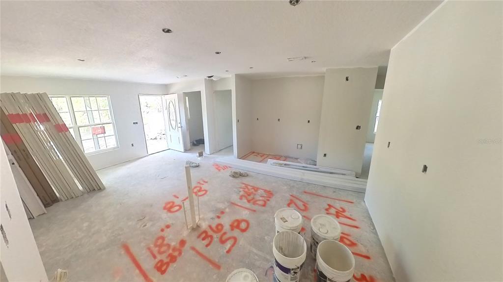 3292 East Porter Street Inverness, FL 34453 - Photo 14 of 34 a bedroom with a bed and a window