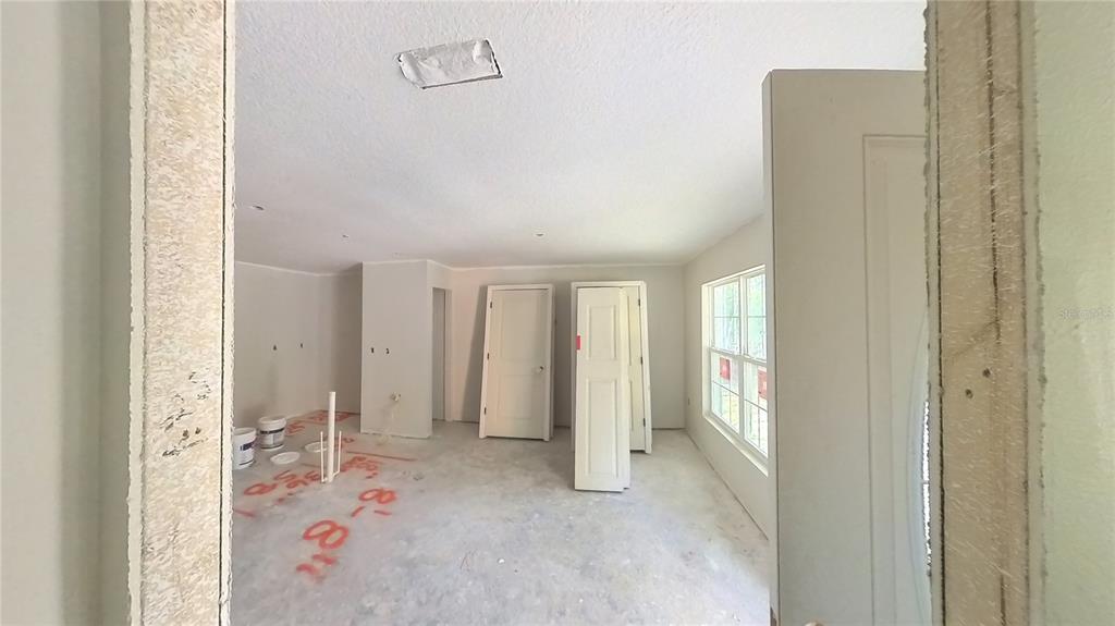3292 East Porter Street Inverness, FL 34453 - Photo 16 of 34 a view of livingroom with furniture and window