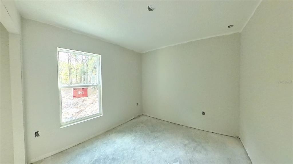 3292 East Porter Street Inverness, FL 34453 - Photo 25 of 34 a view of empty room with window