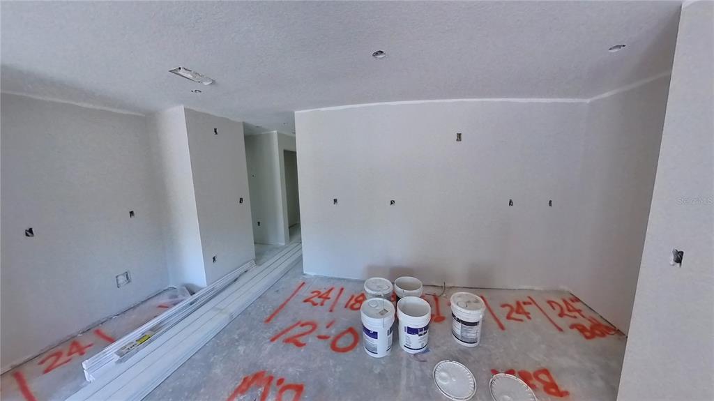 3292 East Porter Street Inverness, FL 34453 - Photo 10 of 34 a bedroom with a bed and a window