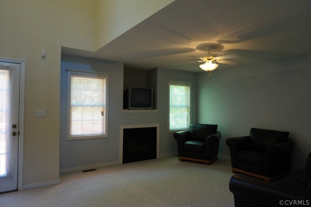 5520 Takach Road Prince George, VA 23875 - Photo 12 of 24 a living room with furniture and a fireplace