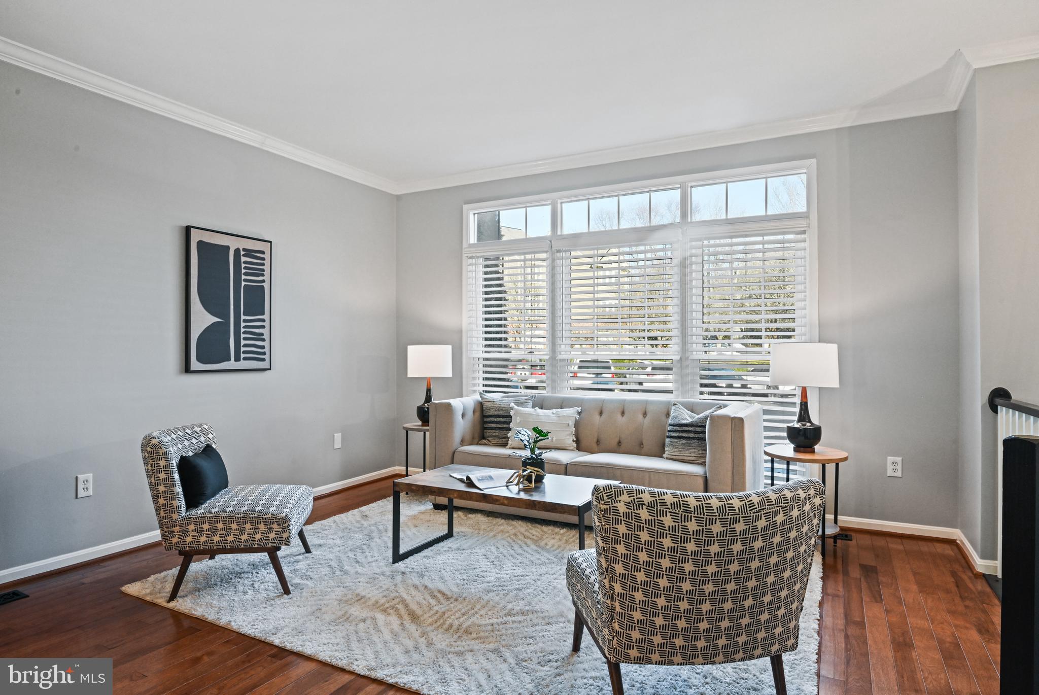 1271 Weatherstone Court Reston, VA 20194 - Photo 5 of 43 a living room with furniture and a large window