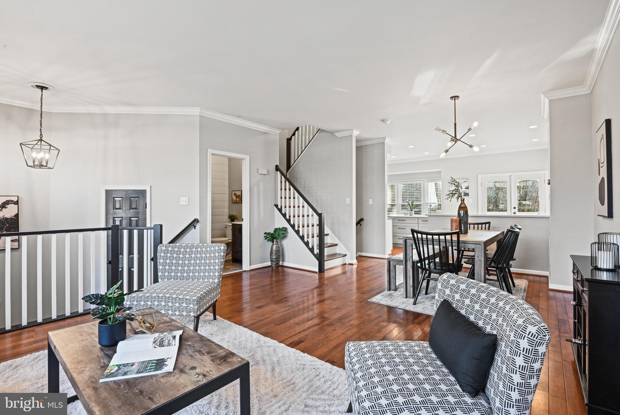 1271 Weatherstone Court Reston, VA 20194 - Photo 7 of 43 a living room with furniture and a wooden floor