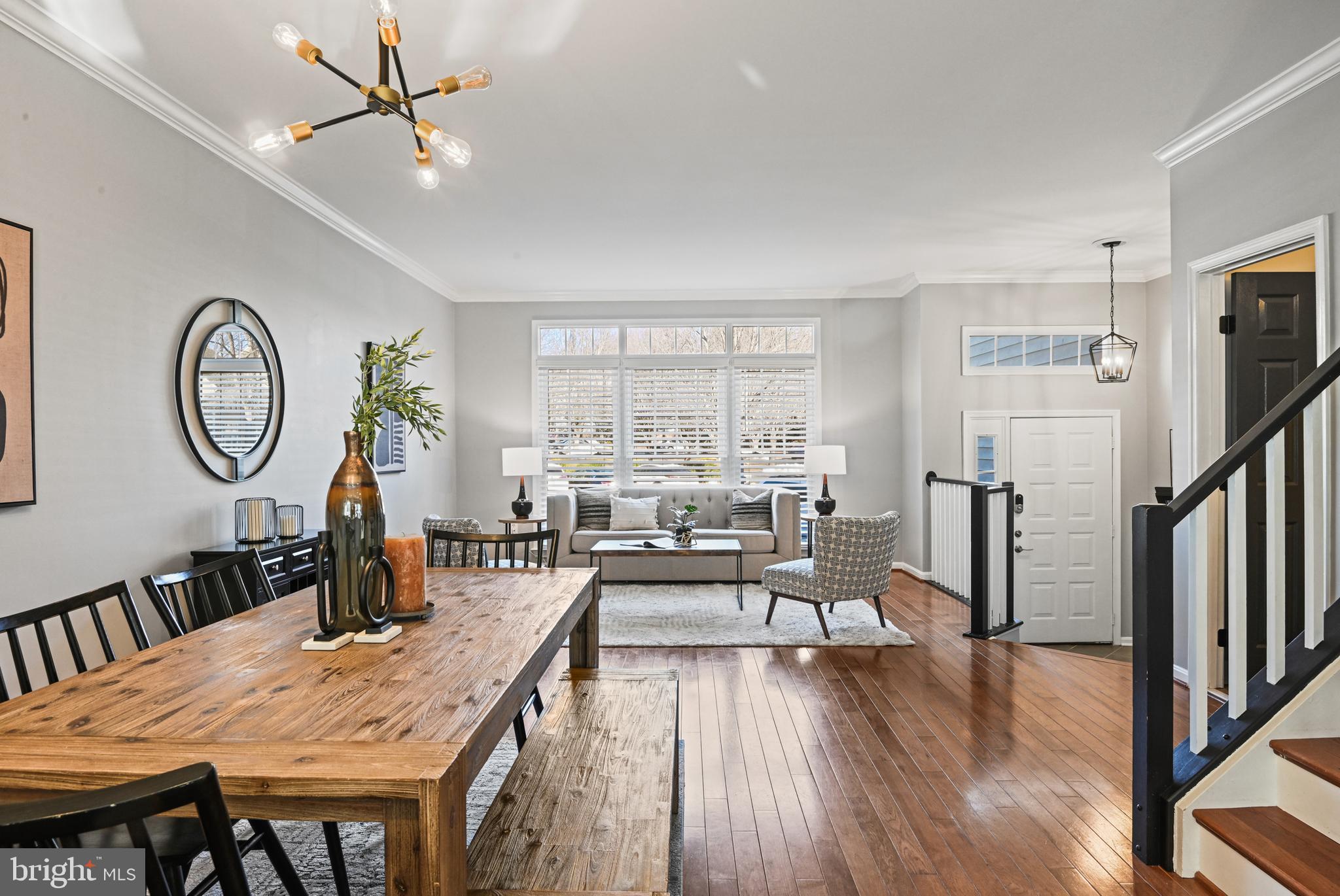 1271 Weatherstone Court Reston, VA 20194 - Photo 9 of 43 a view of a dining room with furniture window and wooden floor