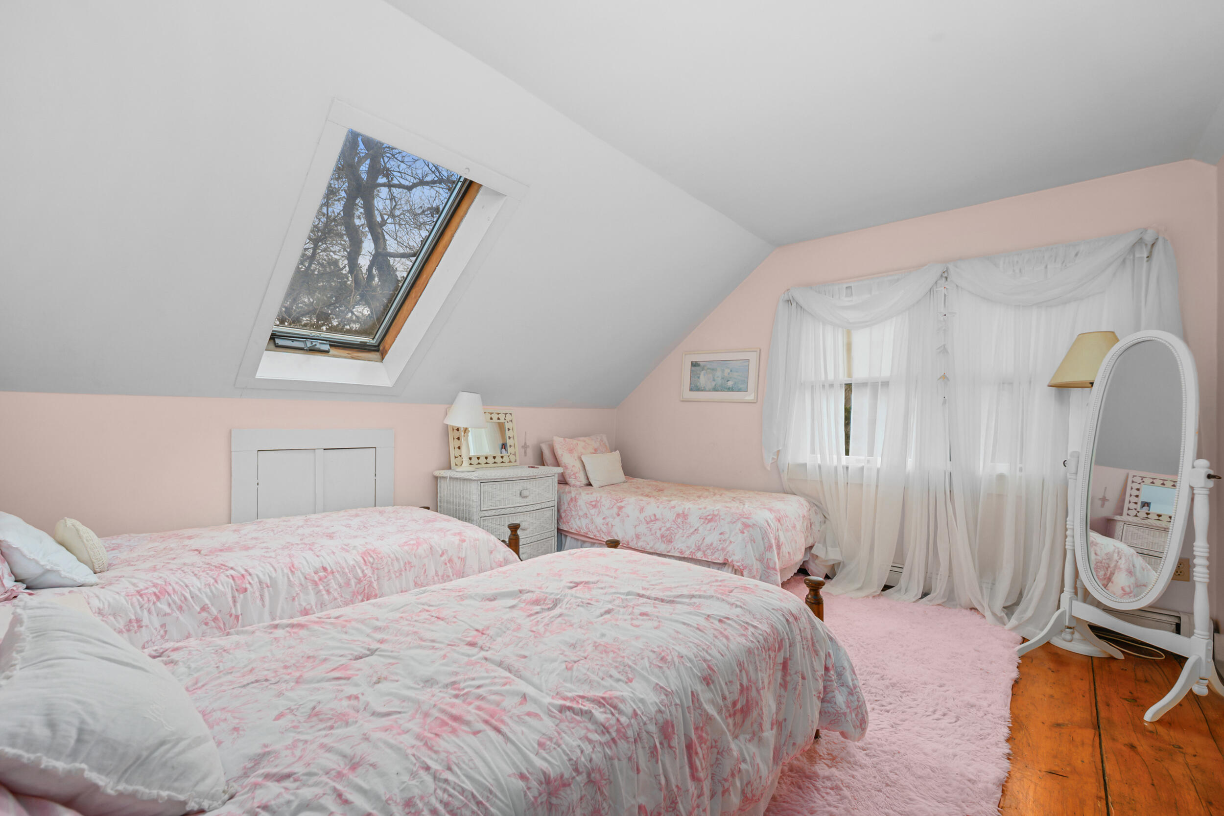 332 South Orleans Road Orleans, MA 02653 - Photo 25 of 42 a bedroom with two beds and painting on the wall