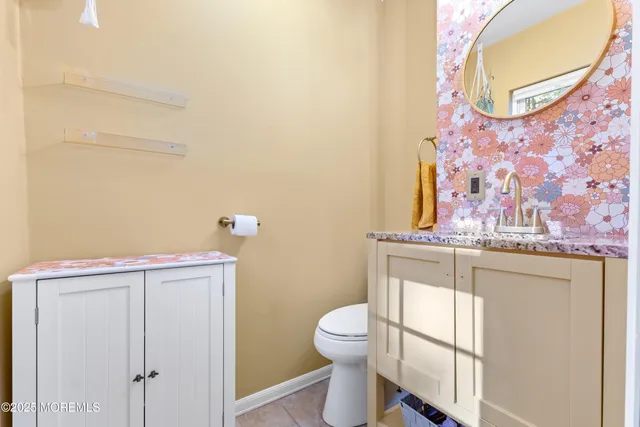 a bathroom with a toilet and a sink