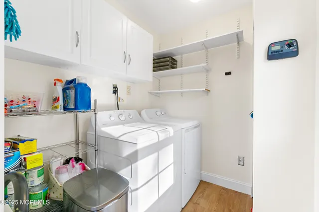 a bathroom with a sink vanity and mirror