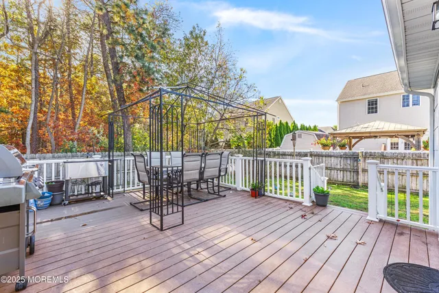 a view of a balcony with chairs