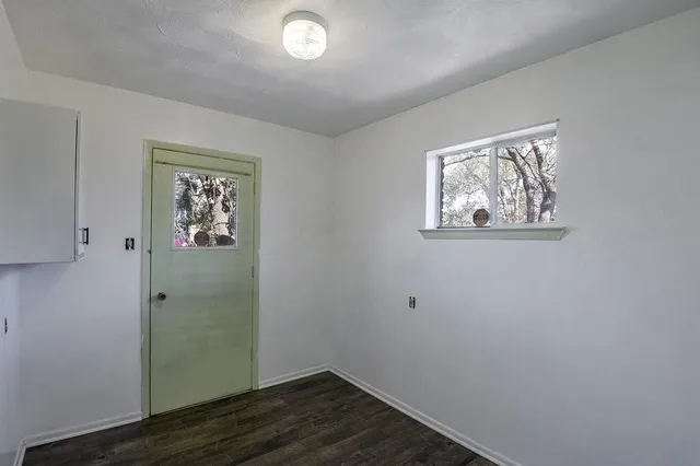 a house with trees in the background