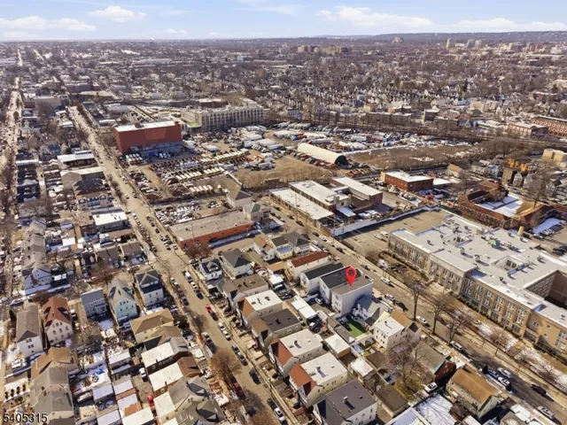 a kitchen with stainless steel appliances granite countertop a refrigerator sink and cabinets