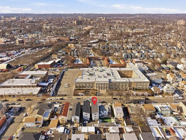 a bed room with a bed and a chair