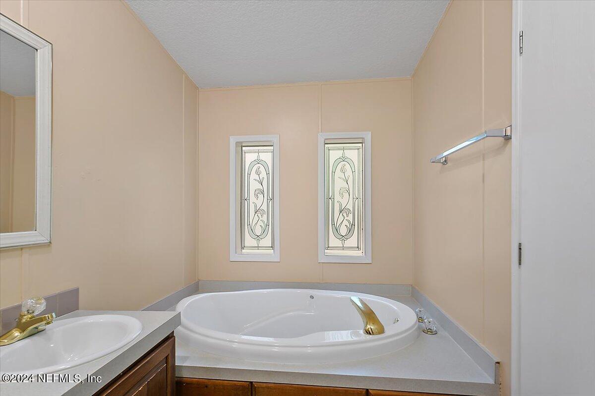 1254 Rigdon Road Jacksonville, FL 32220 - Photo 14 of 22 10-Primary Bathroom