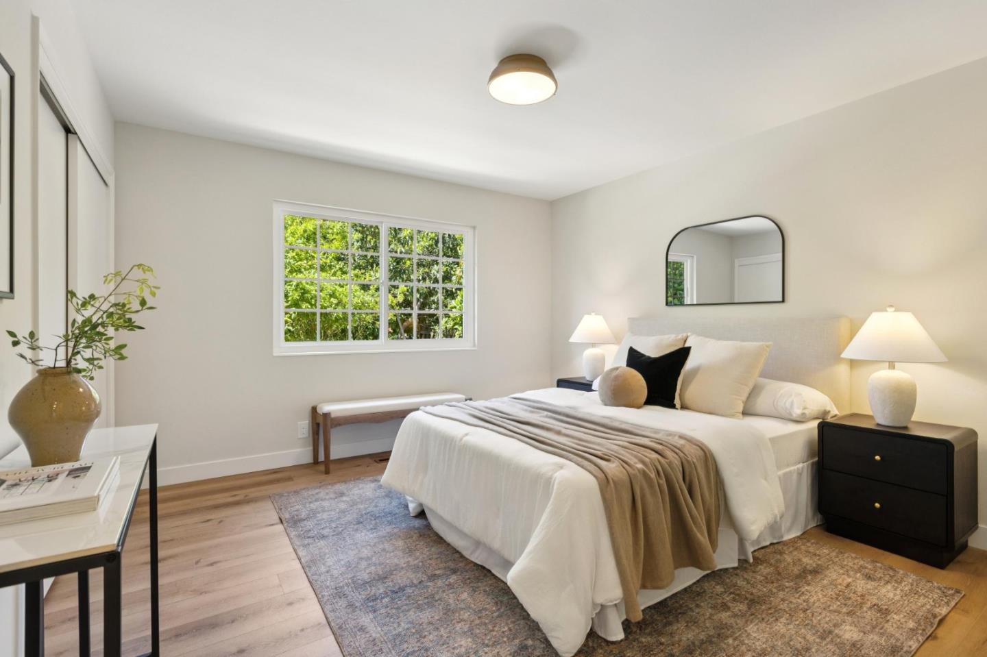755 Santa Rita Avenue Los Altos, CA 94022 - Photo 35 of 50 a bedroom with a bed and a chair
