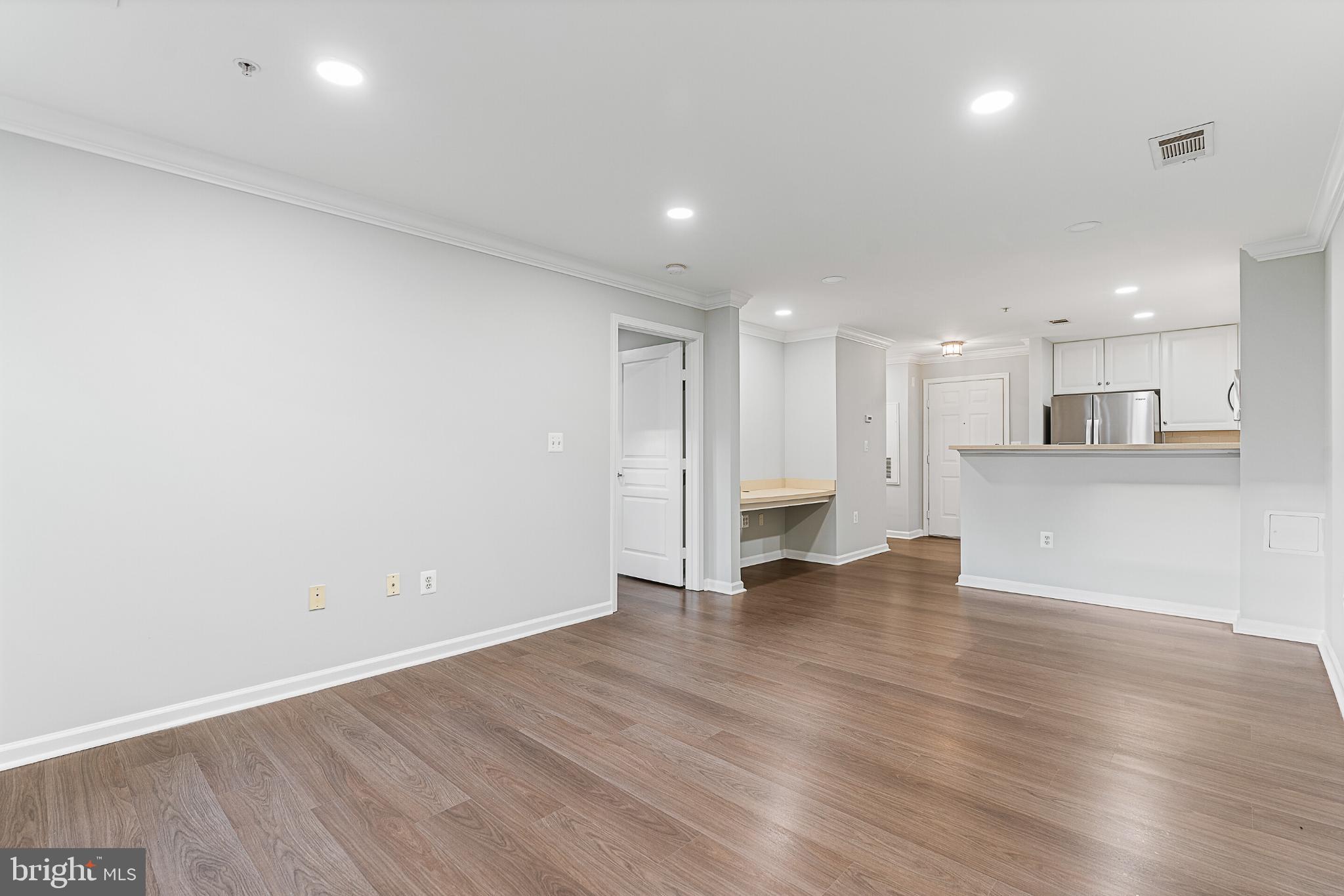 12001 Market Street, Unit T37 Reston, VA 20190 - Photo 9 of 14 Contemporary, recessed lighting throughout.