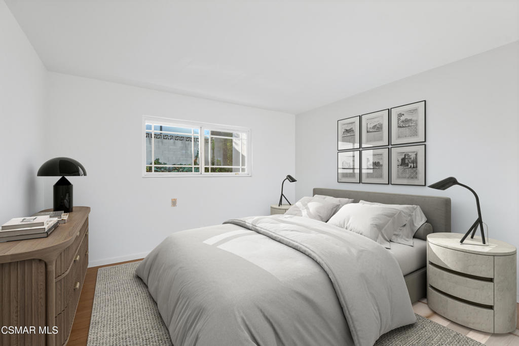 16138 Meadowcrest Road Sherman Oaks, CA 91403 - Photo 22 of 36 a bedroom with a bed and window