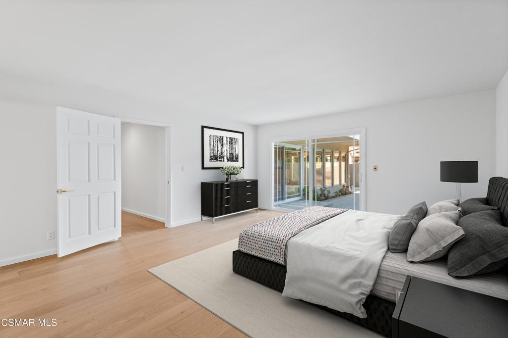 16138 Meadowcrest Road Sherman Oaks, CA 91403 - Photo 29 of 36 a bedroom with a bed and a couch