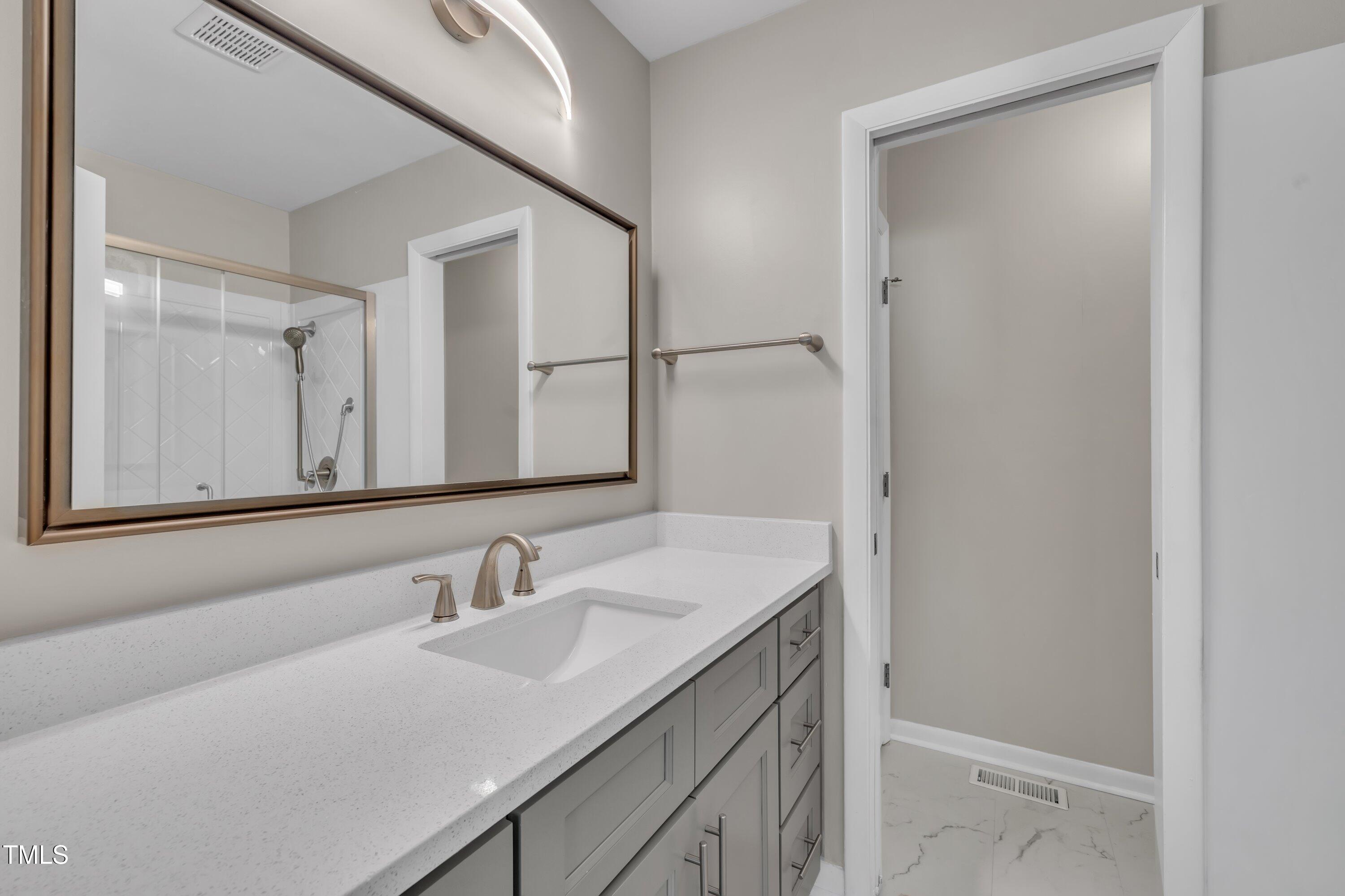 215 Longview Drive Smithfield, NC 27577 - Photo 33 of 45 Primary Ensuite