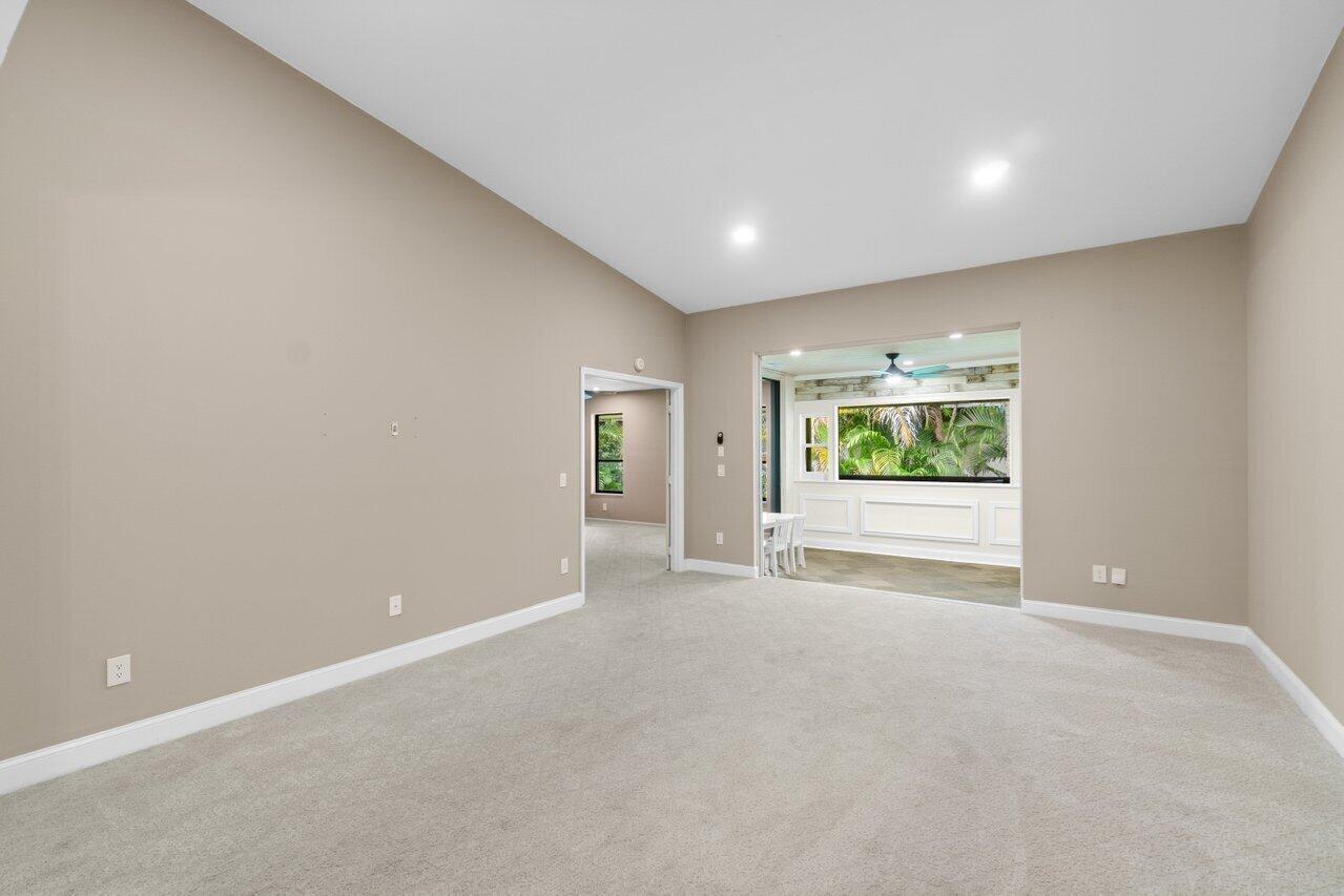 9240 Sabal Ridge Circle, Unit B Boca Raton, FL 33428 - Photo 8 of 22 Vaulted ceiling and recessed lighting