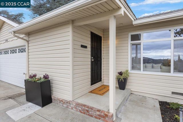 a view of a entryway door front of house
