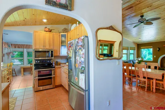 a view of living room and kitchen view