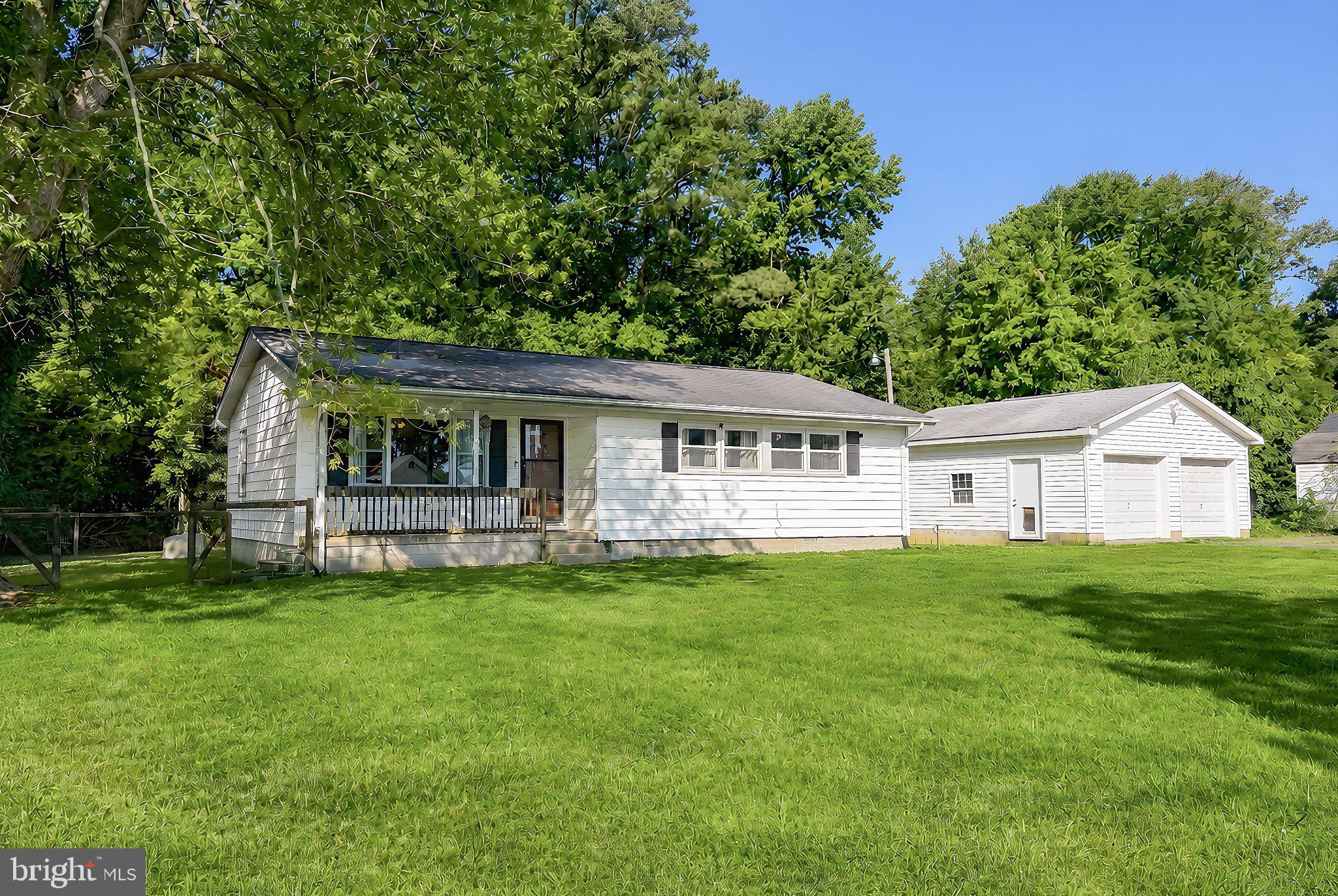 13315 Point Lookout Road Ridge, MD 20680 - Photo 1 of 51 Charming home on lush green grounds.