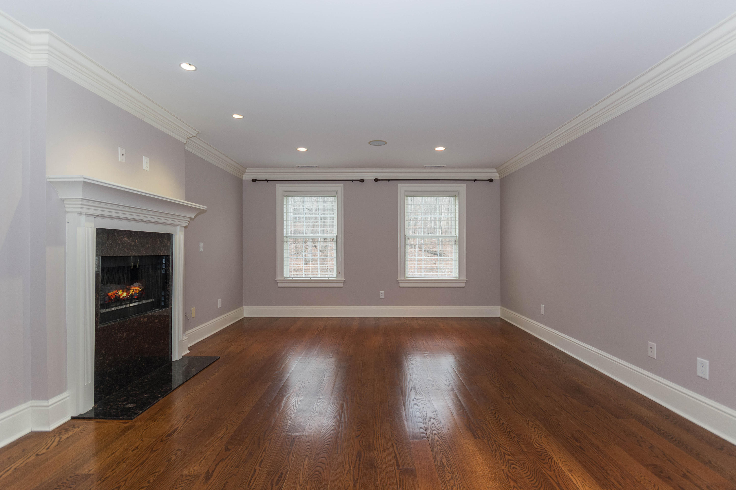 200 Limestone Road Ridgefield, CT 06877 - Photo 16 of 25 a view of an empty room with wooden floor and a window