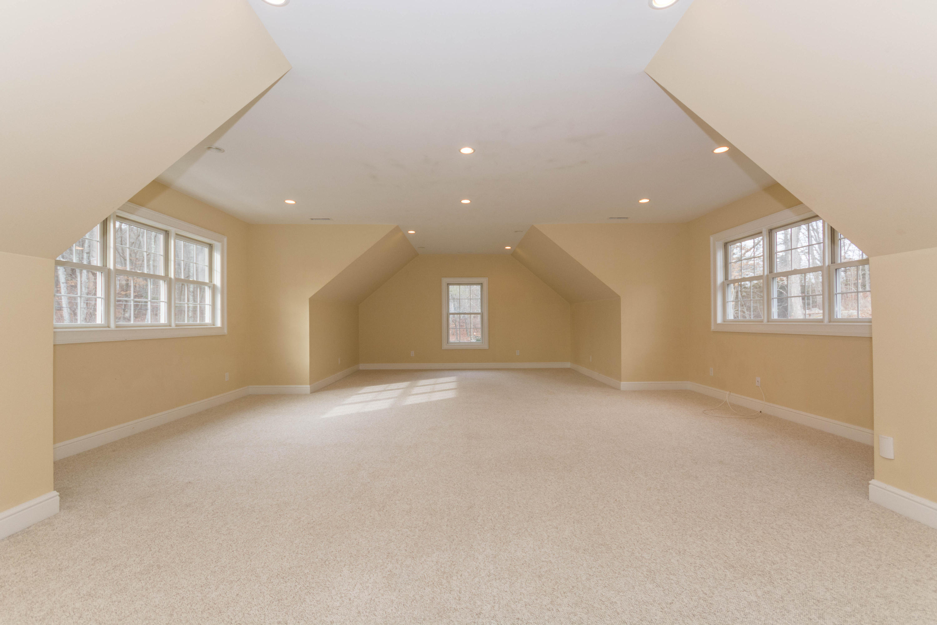 200 Limestone Road Ridgefield, CT 06877 - Photo 22 of 25 an empty room with windows and closet
