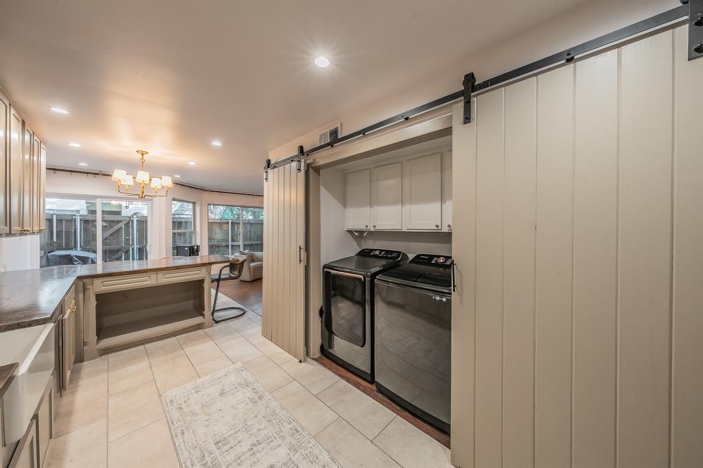 14151 Montfort Drive, Unit 332 Dallas, TX 75254 - Photo 15 of 35 a kitchen with stainless steel appliances granite countertop a refrigerator and a sink